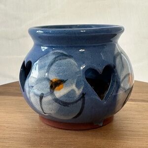 Pottery fenestrated candle votive Stamped Hand painted Blue w/ white flower